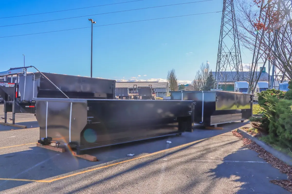 Roll-off dumpster ready for waste disposal at job site for Demolition Dumpster Rental in New Brunswick